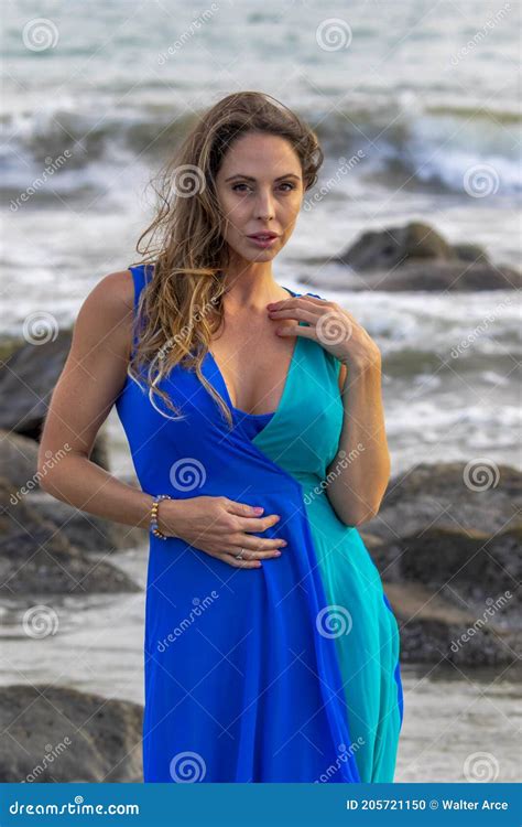 Lovely Brunette Latin Model Poses Outdoors On A Beach At Sunset Stock Photo Image Of Glamorous