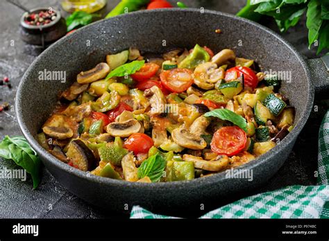 Hot Spicy Stew Eggplant Sweet Pepper Tomato Zucchini And Mushrooms Stock Photo Alamy
