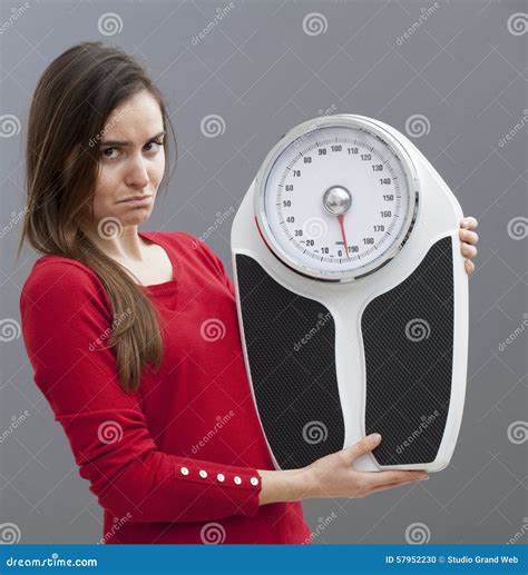 Disappointed Smart 20 Girl Holding Scales For Checking Weight Loss