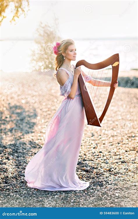 Beautiful Woman With Harp Stock Photo Image Of Hairdo