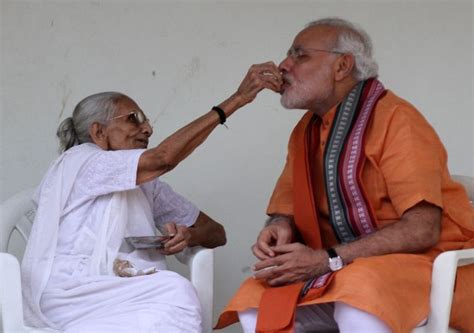 Pm Modi Visits Mothers Home Seeks Blessings On Birthday