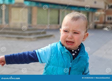 Close Up Of Baby Boy Crying On The Street Stock Photo Image Of City