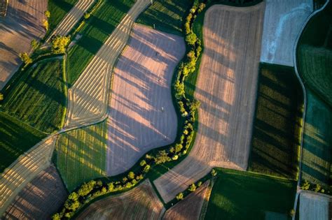 Premium Photo | Aerial view of landscaped field