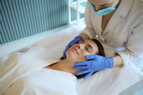 Beautiful Woman Enjoying A Professional Smoothing Rejuvenating Facial