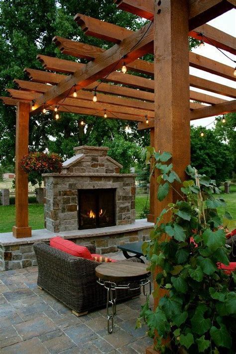 Love the pergola and patio in 2024 | Backyard fireplace, Backyard patio ... 