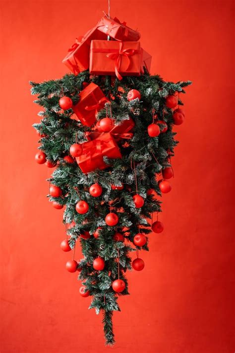 An Inverted Christmas Tree Hanging in the Air Art Object Stock Photo ...