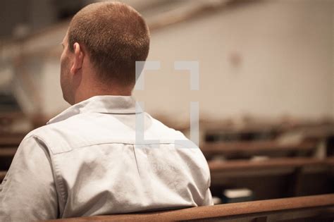 Man Sitting In A Church Pew — Photo — Lightstock