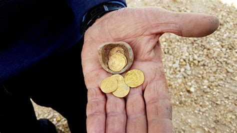 Ancient 'piggy bank' of gold coins uncovered at dig in central Israel ...