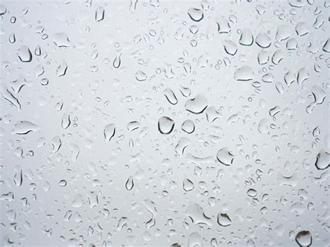 Premium Photo Water Drops On Glass Surface