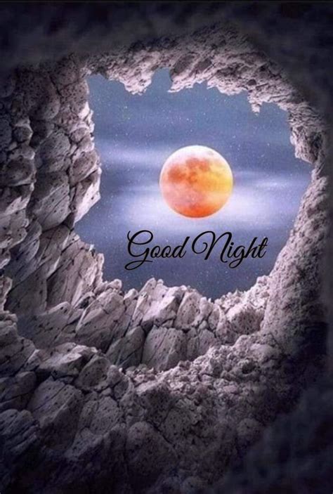 An Open Hole With The Words Good Night On It And A Red Moon In The