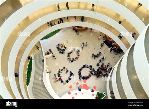 Visitors and schoolchildren, interior of Solomon R. Guggenheim Museum ...