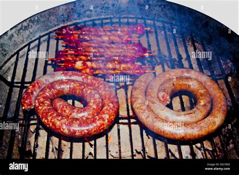 Traditional South African barbecue of sausage and kebabs Stock Photo - Alamy