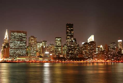 Manhattan skyline at Night stock image. Image of bridge - 1493277