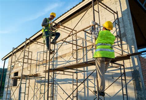 OSHA Workers Balance On Scaffolding Without Harnesses In Dizzying