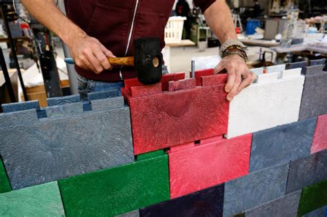 precious plastic community recycling business recycled brick plastic
