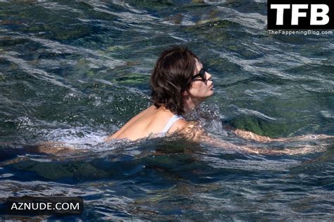 Charlize Theron Sexy Seen Flashing Her Nude Tits At The Beach In Tuscany Aznude