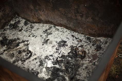 Ashes In The Trash Can Burnt Paper In The Container Coal From