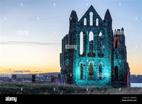 Illuminated Whitby Abbey October 2021 Stock Photo - Alamy