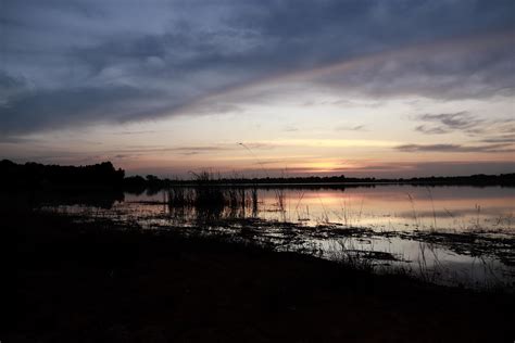 Beautiful nature view at sunset, red-orange sky view and river at ...