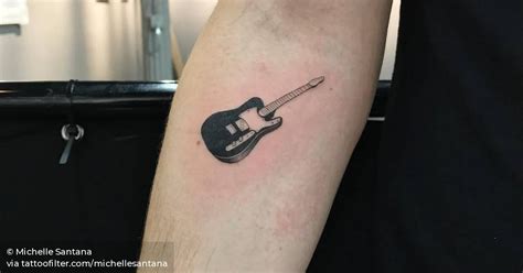 Small Guitar Tattoo On The Right Inner Forearm