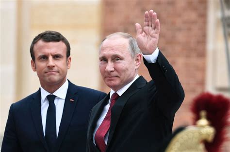 Macron Putin Hold Tense First Meeting Wsj