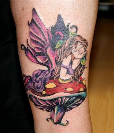 Colorful Fairy Lying On Mushroom Tattoo Tattooimages Biz