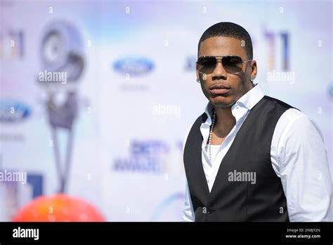 Nelly arrives at the BET Awards on Sunday, June 26, 2011, in Los Angeles. (AP Photo/Chris ...