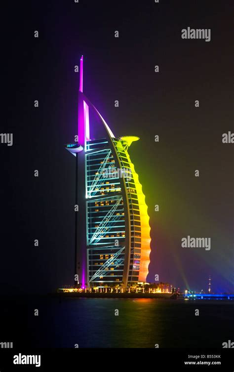 Jumeirah, Dubai, United Arab Emirates. Burj Al Arab hotel illuminated ...