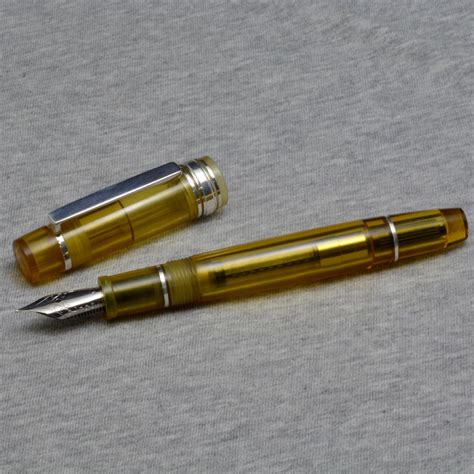 Amber demonstrator pen | The International Association of Penturners