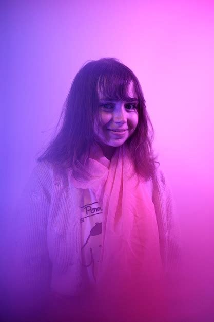 Premium Photo Portrait Of Young Woman Wearing Sunglasses Against Yellow Background