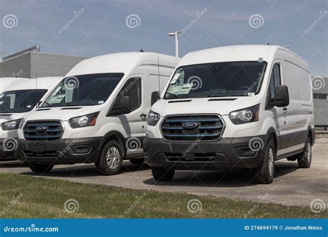 Ford E-Transit Cargo Van Display at a Dealership. Ford Offers the E ...