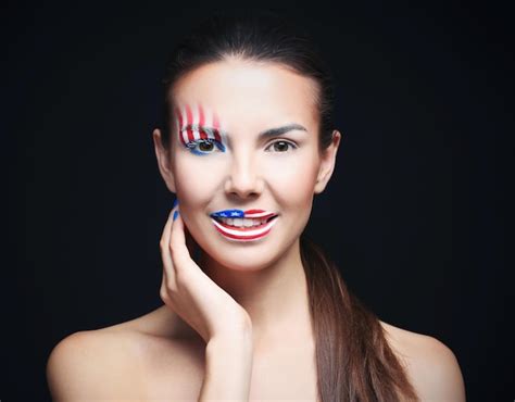 Premium Photo | Girl with USA makeup on black background