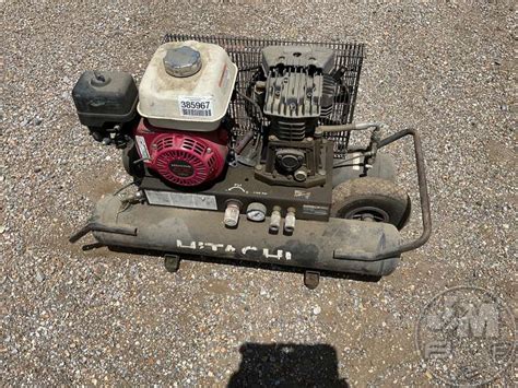 Hitachi Portable Air Compressor Jeff Martin Auctioneers Inc