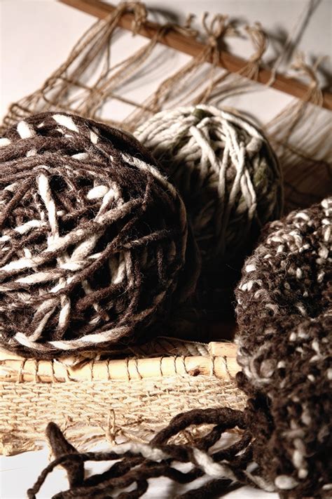 Hand spinning yarn on Behance