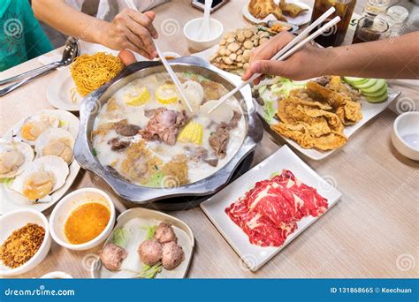 Shabu Broth Shoyu Soup Base And Clear Soup Base In Hot Pot With Steam That Ready For Boiling