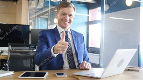 Thumbs Up by Businessman in Office — Stock Photo © ramerocrist.gmail ...