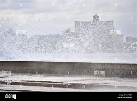 Waves Crashing Against The Wall In Malecon Havana Cuba Stock Photo