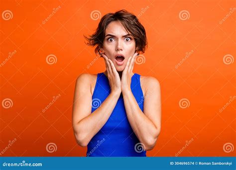 Photo Of Impressed Scared Girl Dressed Blue Top Open Mouth Arms Cheeks