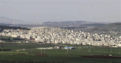 Syria: Turkey says Afrin town encircled, agreement reached over ...