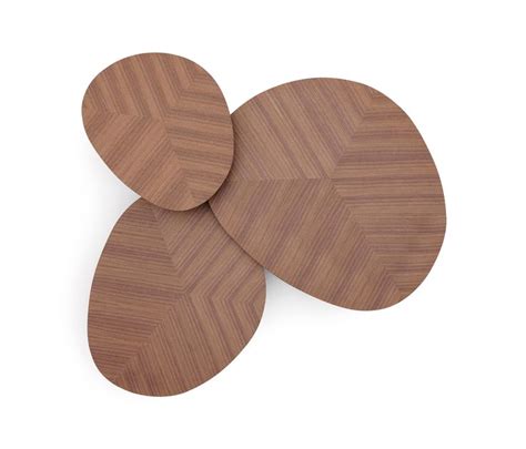 Three Circular Wooden Coasters Sitting On Top Of Each Other In The