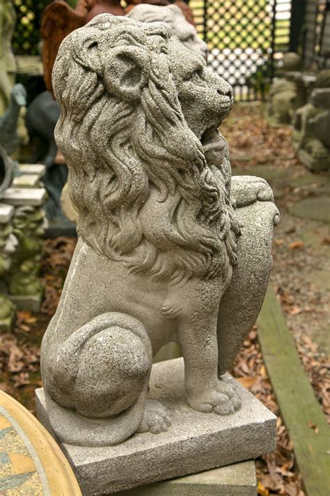 Pair Seated Cast Concrete Lions With Shields For Sale At Stdibs