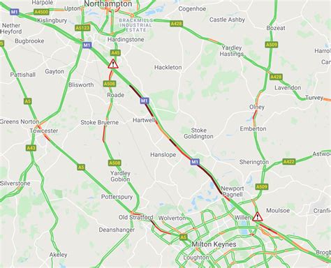 northbound northampton  minute delays overturned car west