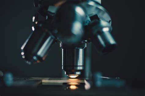 Premium Photo Closeup Shot Of Microscope With Metal Lens At Laboratory