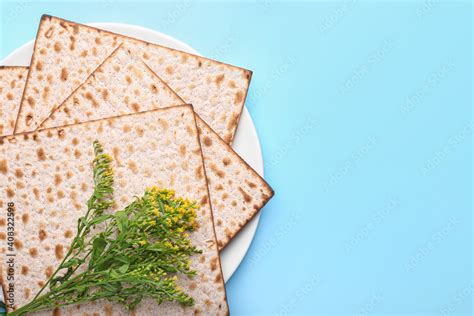 Plate With Jewish Flatbread Matza For Passover On Color Background