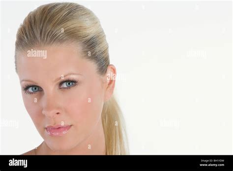 Portrait Of Woman With Blonde Ponytail Stock Photo Alamy