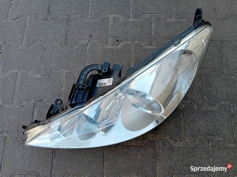 Peugeot 207 soczewka reflektor lampa lewy przód Przeźmierowo