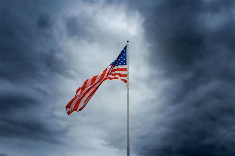 A windy day makes the American flag blow in the wind | Smithsonian ...