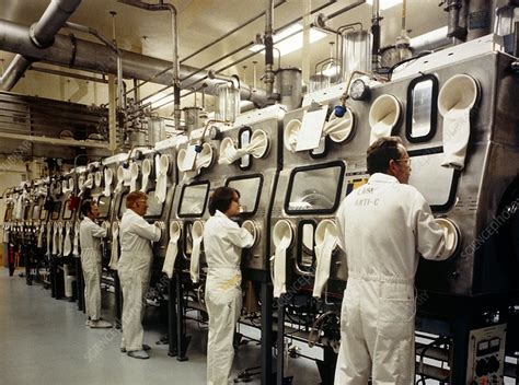 Workers Using Glovebox To Handle Plutonium Stock Image T1750003