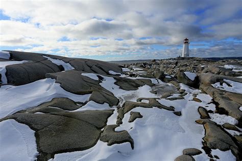 Peggys Point Lighthouse In Winter Peggys Cove Nova Scotia C Photograph By Gary Corbett