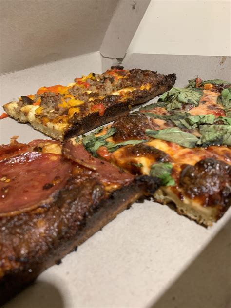 Pizza Slices from Mama’s Too on UWS Manhattan. The caramelized cheese